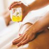 Hot oil massage by caucasian female RMT