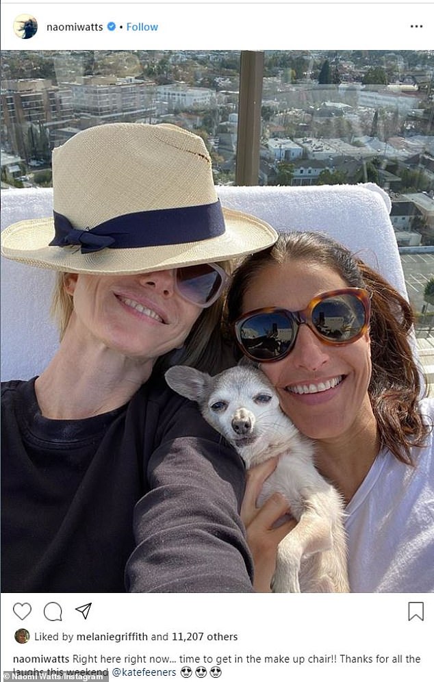 Pre glam: Watts shared a photo showing her relaxing in the sunshine wearing a straw fedora and black sweatshirt with a pal. In the caption, she wrote: 'Time to get in the makeup chair....'
