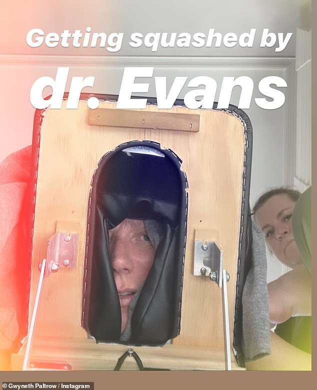 Prep: Gwyneth Paltrow shared this image of her makeup-free face poking through the hole in a massage table as a masseuse worked on her back ahead of the Golden Globes on Sunday